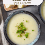 Overhead shot of a bowl of potato leek soup with bread, text overlay reads “Potato Leek Soup – Easy & Creamy.”
