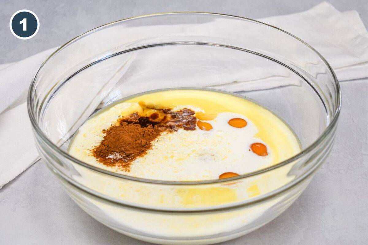 Milk, half and half, eggs, sugar, cinnamon, and vanilla in a large, glass bowl.