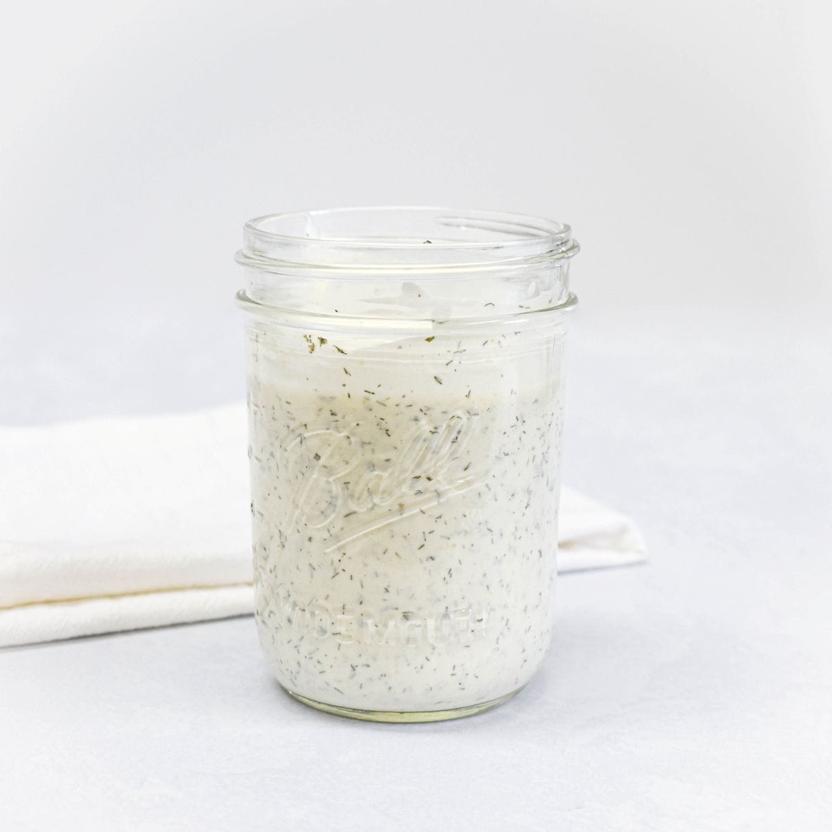Ranch dressing mixed in a glass jar until smooth and creamy.