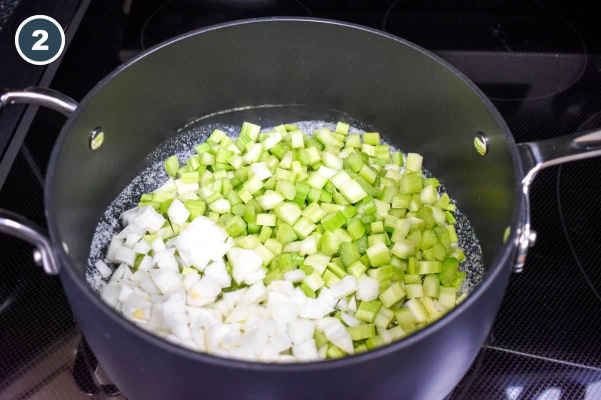 Chopped celery and onion added to melted butter in a medium saucepan.